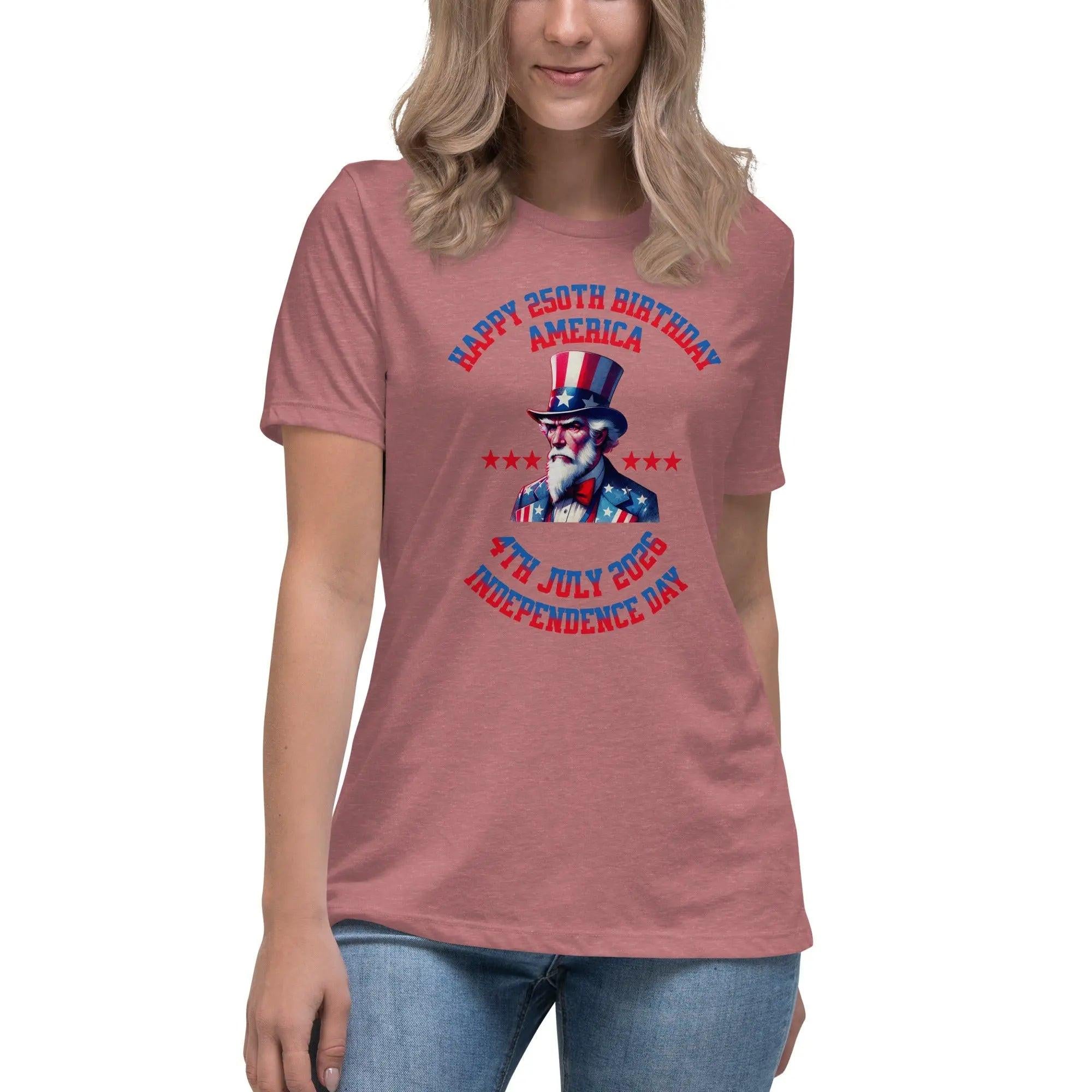 A woman wearing a mauve heather patriotic t-shirt with Uncle Sam and the text "Happy 250th Birthday, America, and 4th July 2026, Independence Day."