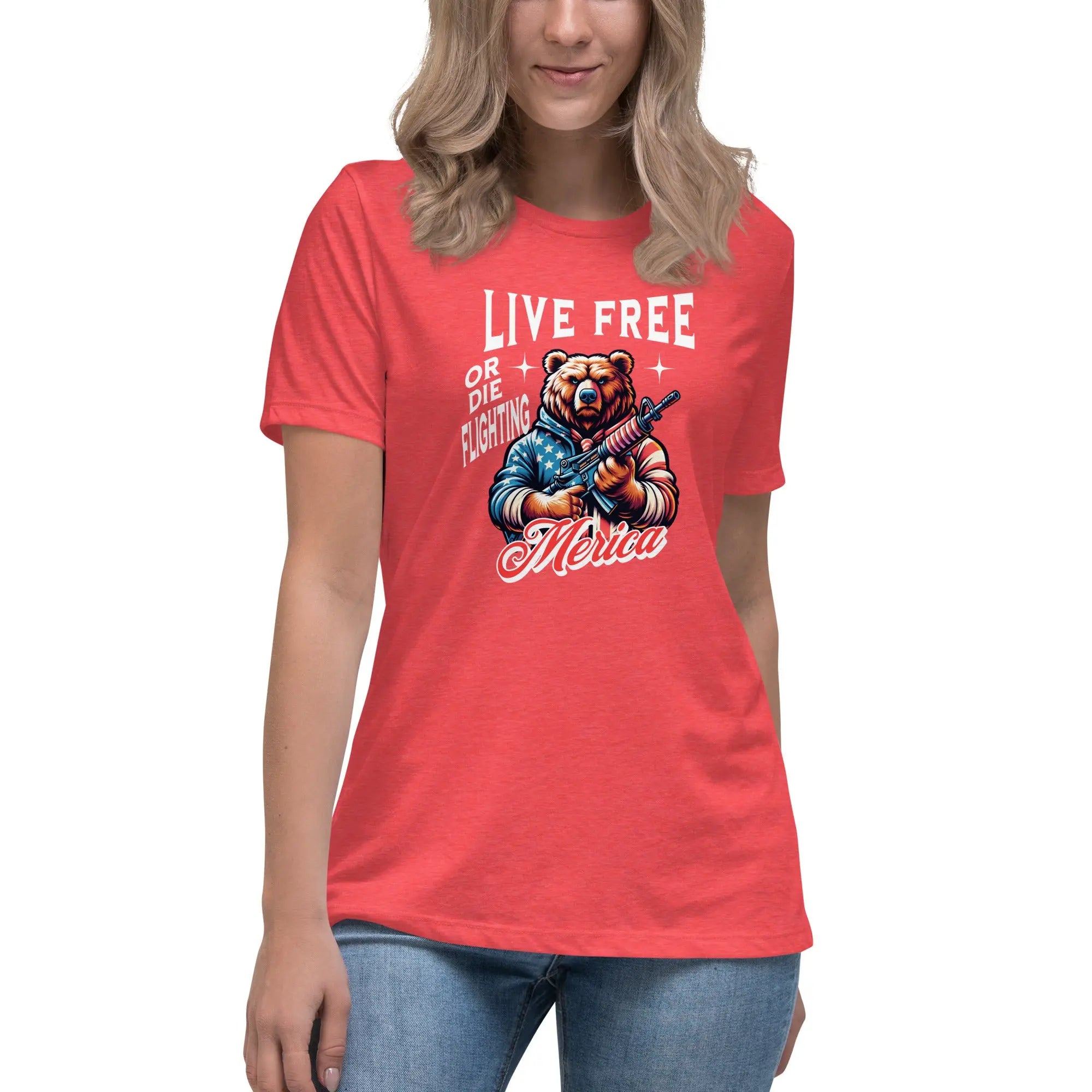 A woman wearing a heather red patriotic t-shirt with a bear holding a gun and "Live Free or Die Fighting" text.