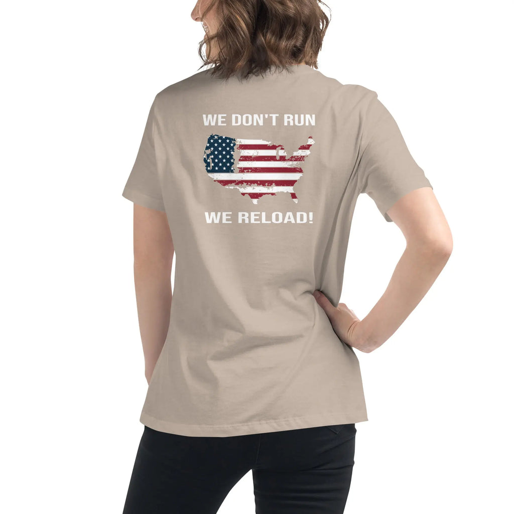 Back of woman wearing a heather stone patriotic t-shirt with a silhouette of America and  "We Don't Run, We Reload" text