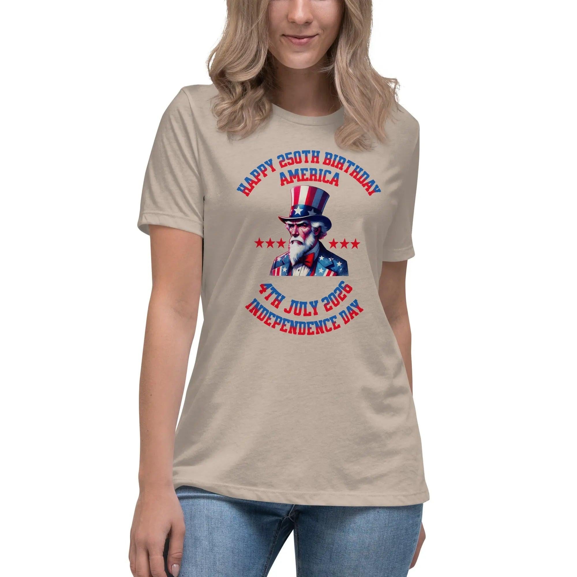 A woman wearing a stone heather patriotic t-shirt with Uncle Sam and the text "Happy 250th Birthday, America, and 4th July 2026, Independence Day."