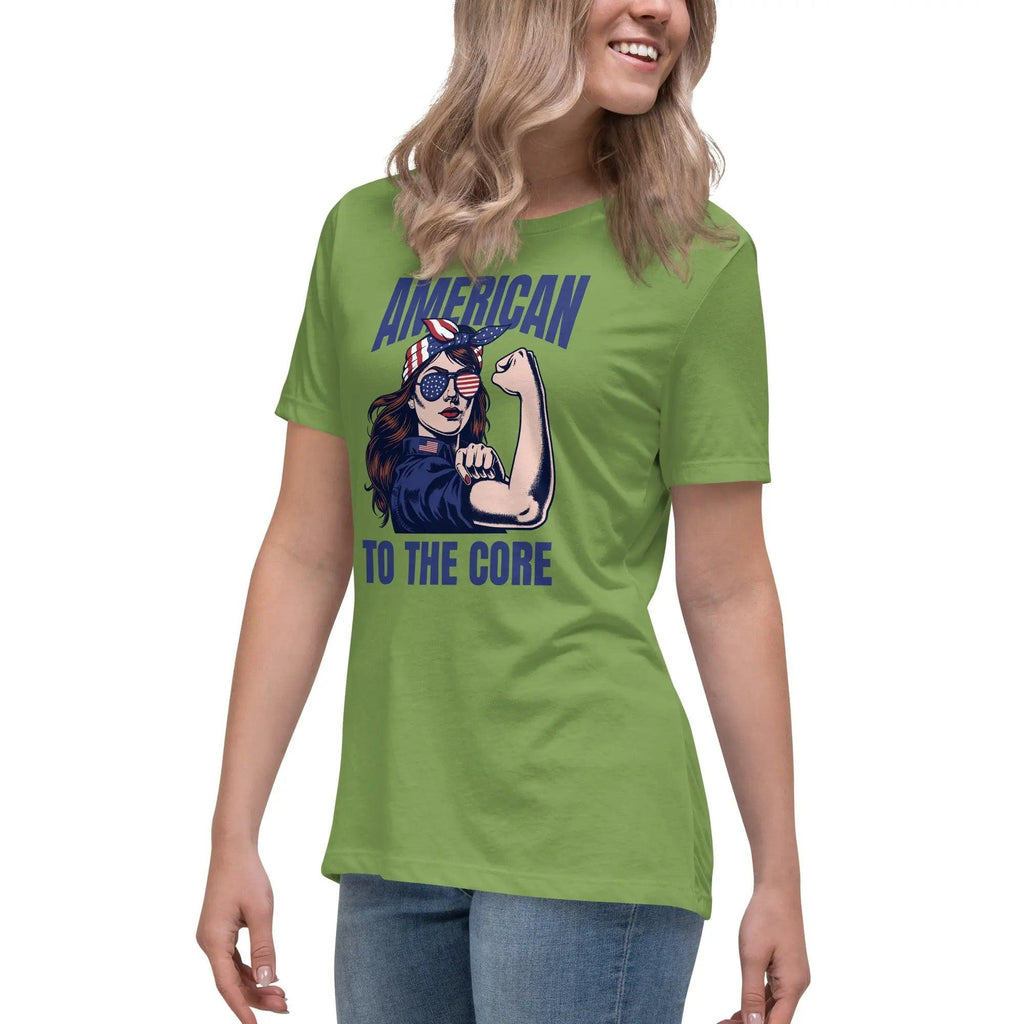 A woman wearing a leaf green, patriotic t-shirt with a strong woman and "American To The Core" text.