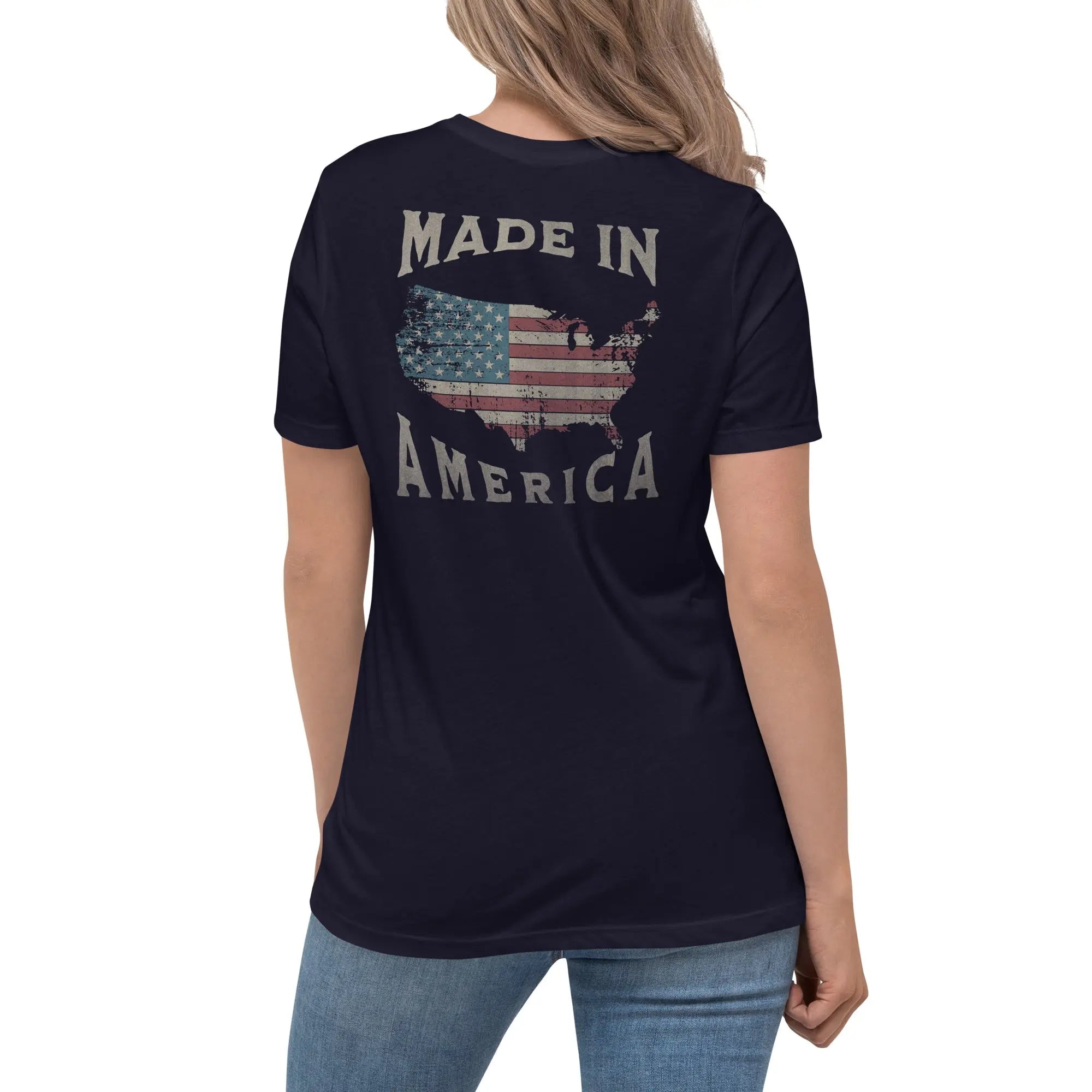 Back of woman wearing a navy  patriotic t-shirt with silhouette of America and  "Made In America" text