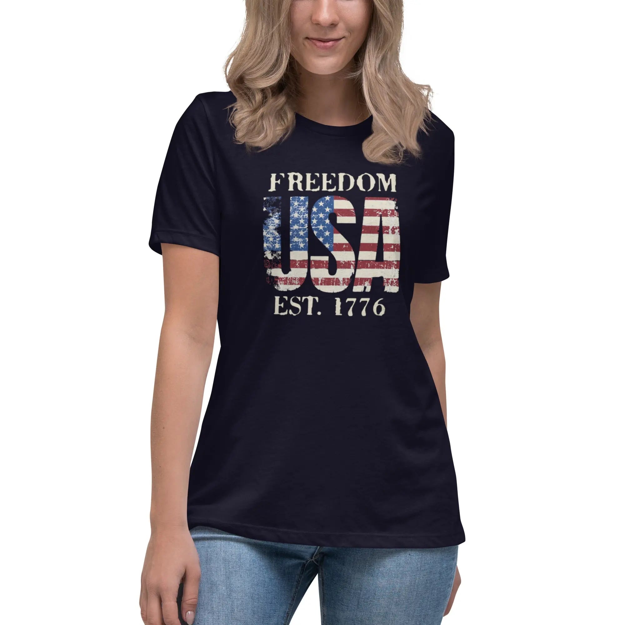 Back of woman wearing a navy patriotic t-shirt with  "Freedom USA Est. 1776" text