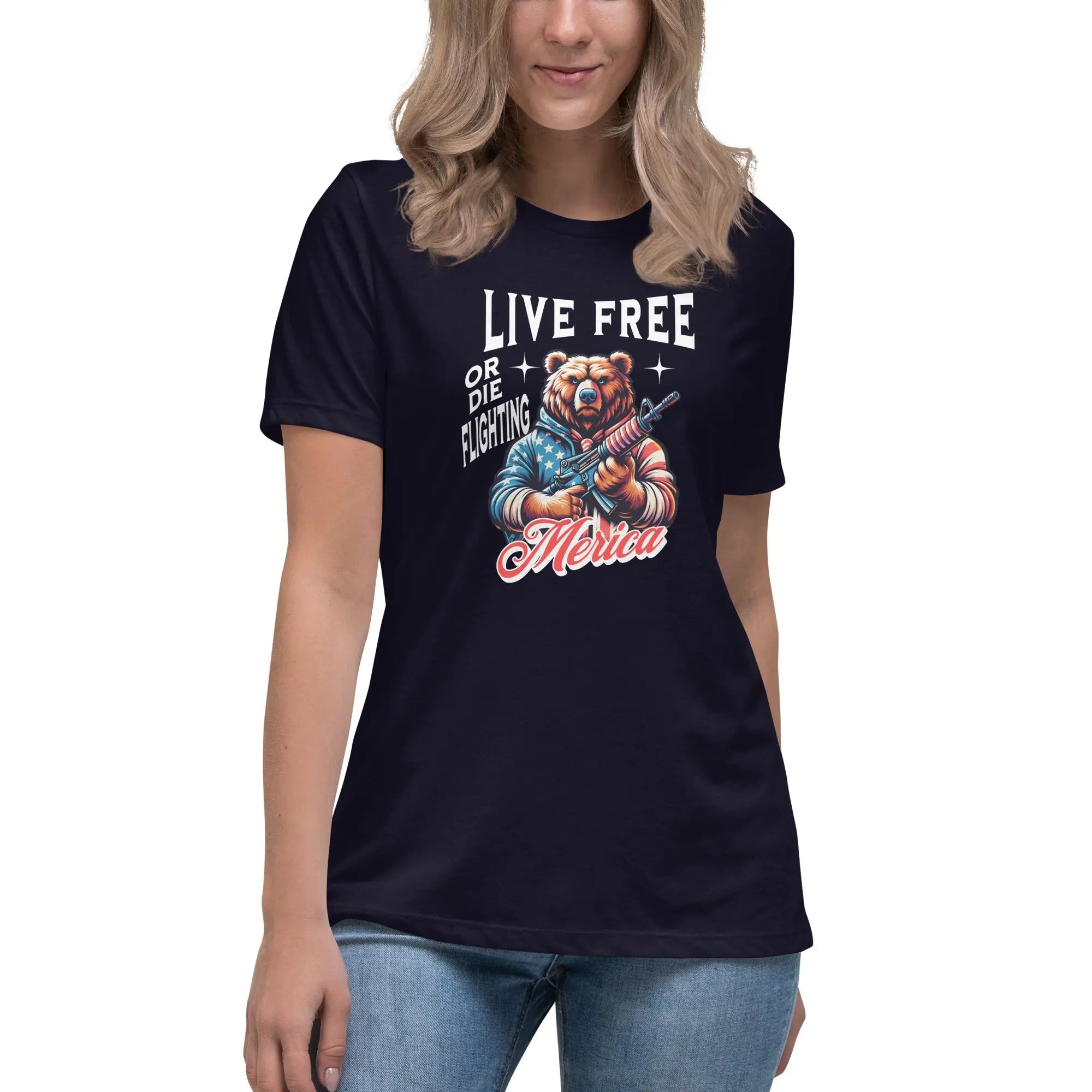 A woman wearing a navy patriotic t-shirt with a bear holding a gun and "Live Free or Die Fighting" text.