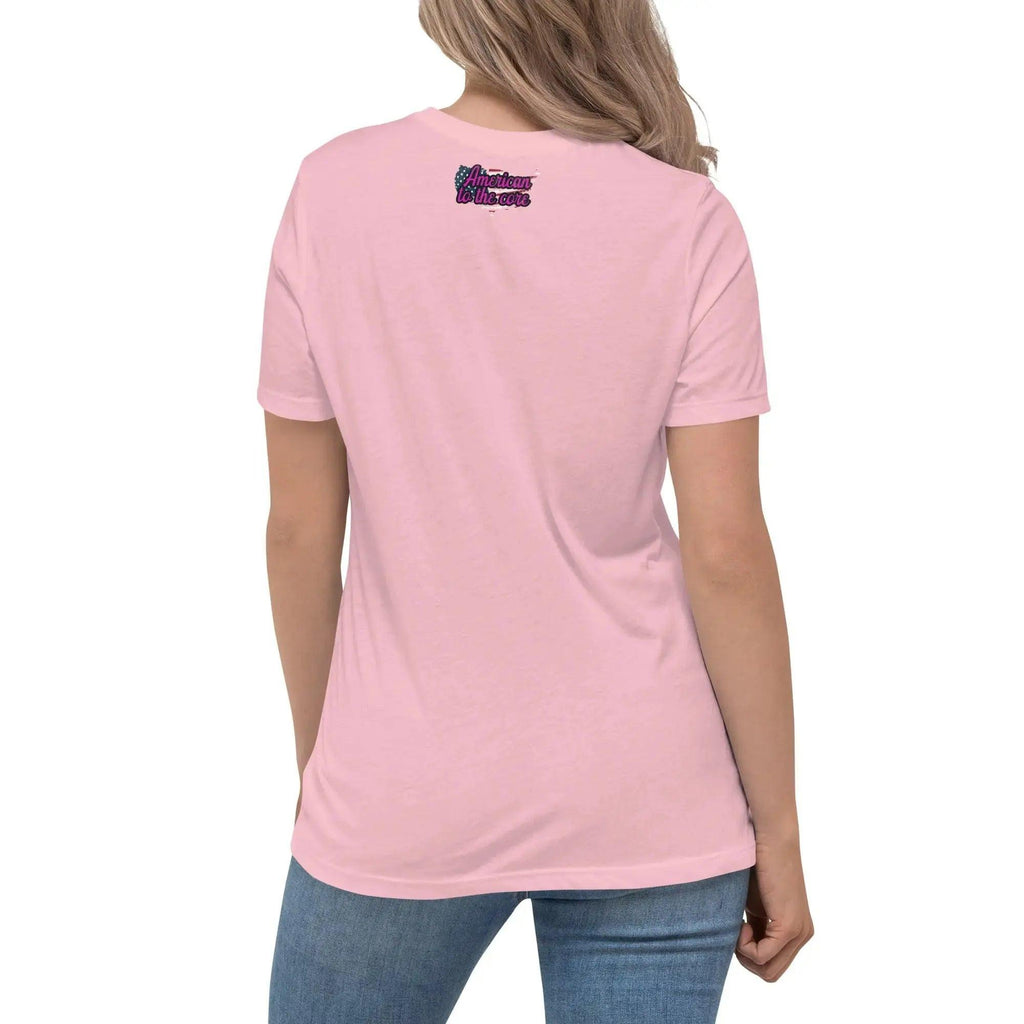Back of a woman wearing a pink patriotic t-shirt with the text "American To The Core"