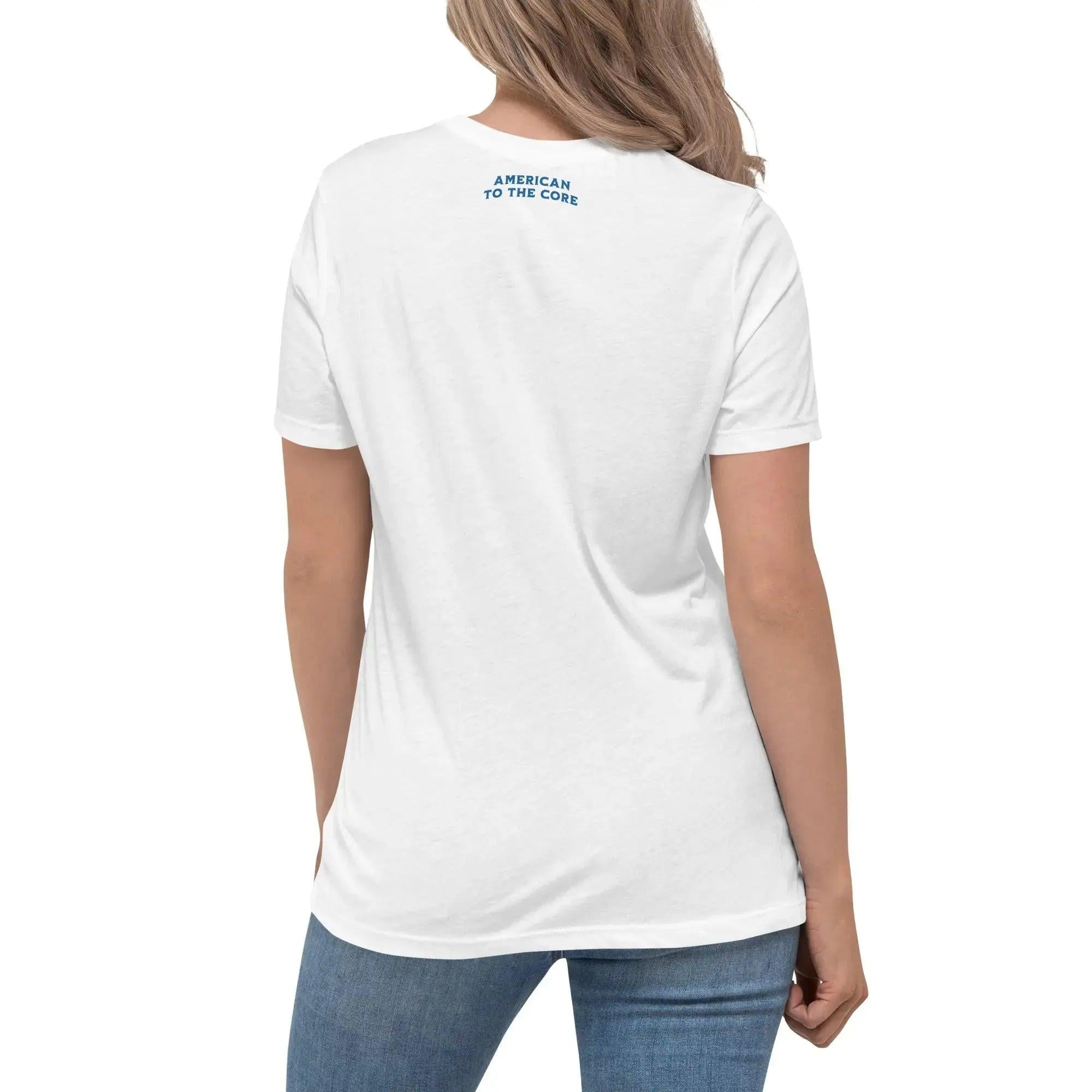Back of a woman wearing a white patriotic t-shirt with the text "American To The Core."